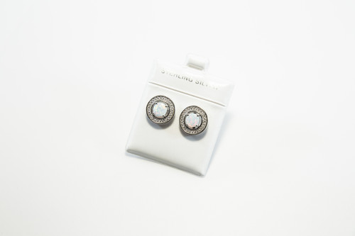 Round Lab Created Opals Surrounded by Cubic Zirconia