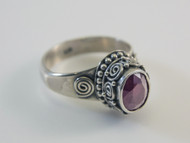 Oval-Cut Ruby and Balinese Scroll Work