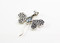 Oval-Shaped Genuine Blue Topaz with Granulated Wings
