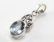 Balinese Filigree and Oval-Shaped Blue Topaz Pendant 