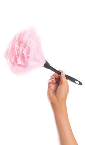 Feather duster costume accessory. Black plastic handle with pink feathered end.