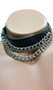 Leather collar with triple chain and studs. Back has adjustable snap closure.