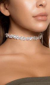 Rhinestone bubble choker with adjustable lobster clasp closure. Measures about 1/2" tall.