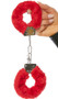 Functional metal handcuffs with faux fur trim detail. Two metal keys are included.