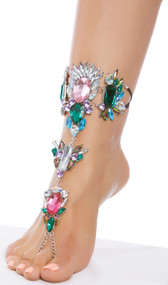 Rhinestone foot jewelry with toe loop, elastic straps, and adjustable lobster clasp closure on chain. One per package.