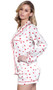 Long sleeve satin pajama set features a heart print long sleeve button up top with collar, left breast pocket and red trim. Matching drawstring shorts with elastic waist.