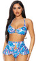 Martinique bikini set includes top with gathered cups featuring a metal O ring accent, criss cross shoulder straps and tie back closure. Matching peplum skirt with swan hook closure and cheeky cut bottoms also included. Three piece set.