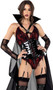 Playboy Vampire deluxe costume set includes sleeveless sequin romper with floral lace overlay, dramatic pointed cups with strappy details, Playboy Bunny logo charm on removable tall vinyl collar, clear adjustable shoulder straps, attached long sheer cape, which is then attached to long sheer floral lace fingerless gloves. Vinyl waist cincher with lace up front, attached adjustable garters with chain detail, and zipper back closure also included. Two piece set.