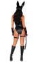 Bondage Bunny set includes sleeveless faux leather bodysuit with stud and chain detail, attached collar and high cut on the leg. Matching vinyl garter belt with attached garter straps, O ring accents, and adjustable back buckle closure also included. Fingerless fishnet gloves, bunny mask with ears and whip also included. Five piece set.