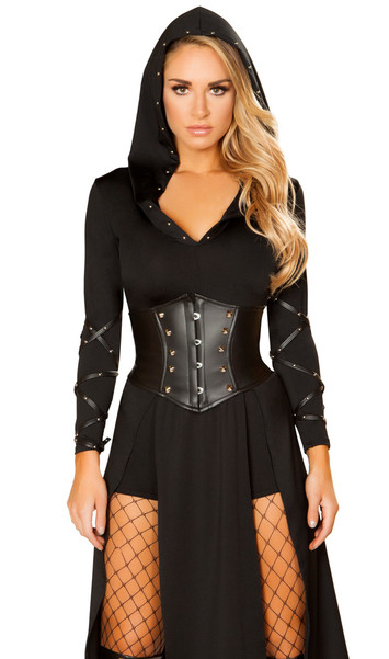 The Queens Assassin costume includes long sleeve dress with attached studded hood, V neckline, long panel skirt with front slits, and attached studded arm wraps. Matching vinyl waist cincher with lace up back and front hook closure also included. Mini shorts also included. Three piece set.