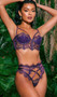Sugar Plum set features a long line eyelash lace and tulle bra with scalloped trim, vinyl accents and boning, underwire balconette cups with strappy accents, o ring details, adjustable shoulder straps, and a hook and eye back closure. Matching high waisted panty features a thong back and cotton gusset. Two piece set.