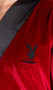 Velvet short length robe features embroidered Playboy Bunny logo, contrast satin trim, and sash tie closure.