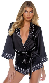 Satin romper features Playboy bunny head logo print trim, contrast piping, patch pocket, collar, three quarter length sleeves with cuffs, and waist sash with tie closure.