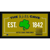 Notre Dame Shamrock Logo 10x20 Framed KIDS CAVE sign with Game used piece of Bench