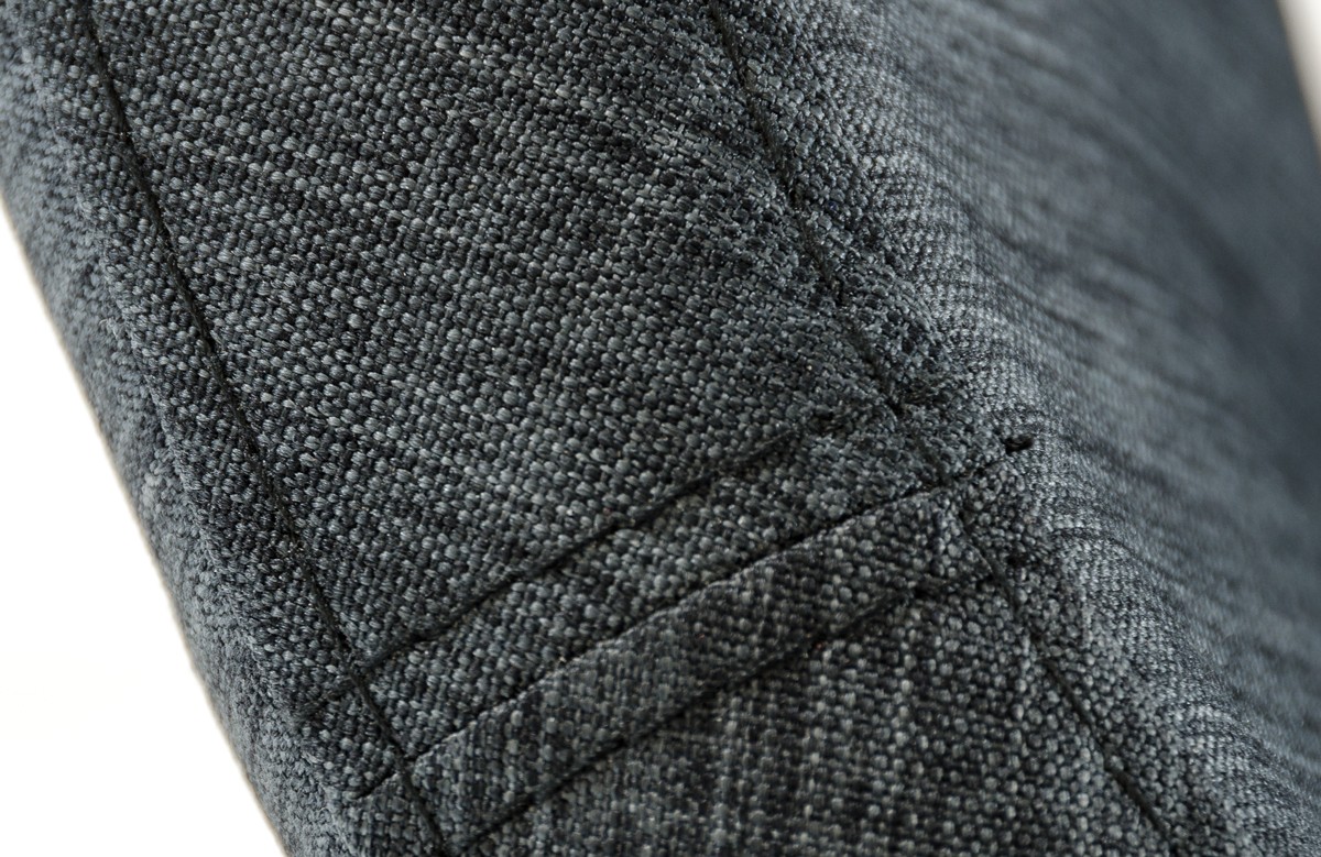close up shot of the grey fabric dining chair The Rudolpho.