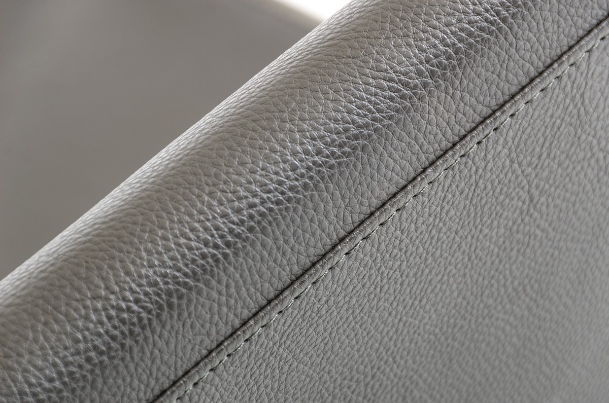 close up shot of jerry bonded leather accent chair grey