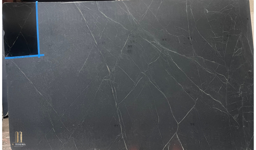 Stormy Black Soapstone Lot 2926

Size 130 x 79 x 3CM



Aesthetic Features : Before mineral oil treatment, this is a dark  gray soapstone with light veining. After mineral oil treatment is becomes a much darker charcoal gray/black and the lighter veining is pronounced. This timeless soapstone countertop exudes elegance and sophistication.

Perfectly balancing luxury with a commanding presence, it will be a standout feature in any space.

Applications: Ideal for both indoor and outdoor installations.

Common Uses:

Outdoor Spaces: Perfect for outdoor kitchens, BBQ surrounds, patio bars, poolside counters, garden workstations, beverage stations, fire pit surrounds, buffet stations, backyard prep areas, outdoor sinks, wet bars, rooftop terrace countertops, and pizza oven surrounds.
Indoor Spaces: Excellent for kitchen countertops, bathroom vanities, kitchen islands, laundry room counters, wet bars, tabletops, backsplashes, waterfall edges, and shower surrounds.
Design Style: Classic Black Soapstone

Product Information:
Stain Resistance

Exceptional Resistance: Non-porous surface eliminates the need for sealing.
Scratch Resistance

Good Protection: Harder than average soapstone due to its lower Talc contents.  
Heat Resistance

Superior Performance: Handles high temperatures, making it perfect for kitchen use.
Hardness

Harder Than Average Soapstone 
Periodic Maintenance

No Sealing Needed: Non-porous, though periodic oiling is suggested to maintain darker  appearance.
Country of Origin

Brazil
Item Weight

Density: 22 lbs per square foot.