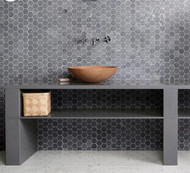 Honed Soapstone Hexagon Mosaic Tiled wall in contemporary lavatory.