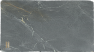 Santa Rita Soapstone Lot 125

Size: 127″ x 68″ x 3cm

Product Overview:
Aesthetic Features : Before mineral oil treatment, this is a dove gray soapstone with darker swirls  in almost. After mineral oil treatment is becomes a much darker charcoal gray with a hint of green. This timeless soapstone countertop exudes elegance and sophistication.

Perfectly balancing luxury with a commanding presence, it will be a standout feature in any space.

Applications: Ideal for both indoor and outdoor installations.

Common Uses:

Outdoor Spaces: Perfect for outdoor kitchens, BBQ surrounds, patio bars, poolside counters, garden workstations, beverage stations, fire pit surrounds, buffet stations, backyard prep areas, outdoor sinks, wet bars, rooftop terrace countertops, and pizza oven surrounds.
Indoor Spaces: Excellent for kitchen countertops, bathroom vanities, kitchen islands, laundry room counters, wet bars, tabletops, backsplashes, waterfall edges, and shower surrounds.
Design Style: Classic Soapstone with a hint of green

Product Information:
Stain Resistance

Exceptional Resistance: Non-porous surface eliminates the need for sealing.
Scratch Resistance

Moderate Protection: Soft material; minor scratches can be easily repaired.
Heat Resistance

Superior Performance: Handles high temperatures, making it perfect for kitchen use.
Hardness

Softer Soapstone 
Periodic Maintenance

No Sealing Needed: Non-porous, though periodic oiling is suggested to maintain darker  appearance.
Country of Origin

Brazil
Item Weight

Density: 22 lbs per square foot.
