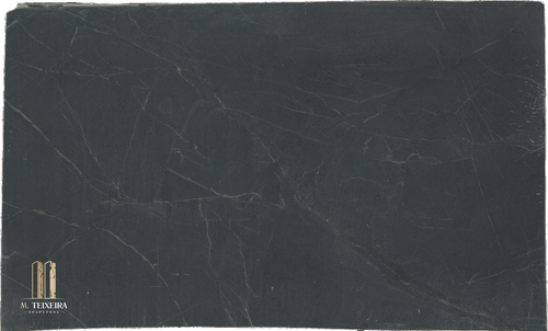 Stormy Black LOT 932

Size 128" x 77" x  3cm

NJ Location

 Discounted Price $1988.00. Price is valid for Pick Up In Glen Rock, NJ ONLY. Please call us for a quote for shipping , fabrication or installation.

Product Overview:
Aesthetic Features : Before mineral oil treatment, this is a dark  gray soapstone with light veining. After mineral oil treatment is becomes a much darker charcoal gray/black and the lighter veining is pronounced. This timeless soapstone countertop exudes elegance and sophistication.

Perfectly balancing luxury with a commanding presence, it will be a standout feature in any space.

Applications: Ideal for both indoor and outdoor installations.

Common Uses:

Outdoor Spaces: Perfect for outdoor kitchens, BBQ surrounds, patio bars, poolside counters, garden workstations, beverage stations, fire pit surrounds, buffet stations, backyard prep areas, outdoor sinks, wet bars, rooftop terrace countertops, and pizza oven surrounds.
Indoor Spaces: Excellent for kitchen countertops, bathroom vanities, kitchen islands, laundry room counters, wet bars, tabletops, backsplashes, waterfall edges, and shower surrounds.
Design Style: Classic Black Soapstone

Product Information:
Stain Resistance

Exceptional Resistance: Non-porous surface eliminates the need for sealing.
Scratch Resistance

Good Protection: Harder than average soapstone due to its lower Talc contents.  
Heat Resistance

Superior Performance: Handles high temperatures, making it perfect for kitchen use.
Hardness

Harder Than Average Soapstone 
Periodic Maintenance

No Sealing Needed: Non-porous, though periodic oiling is suggested to maintain darker  appearance.
Country of Origin

Brazil
Item Weight

Density: 22 lbs per square foot.