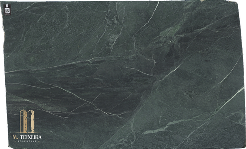 Rainforest Green Soapstone Lot 5544

124″ x 78″

Multiple Slabs available.

Rainforest Green Soapstone from M. Teixeira Soapstone is an exotic and visually striking natural stone, known for its rich green background with dramatic veining in shades of gold, brown, and charcoal. Sourced from select quarries, this soapstone brings the lush beauty of a tropical rainforest into your home, offering a unique combination of elegance and functionality.

Ideal for kitchen countertops, bathroom vanities, fireplace surrounds, and architectural accents, Rainforest Green Soapstone is naturally non-porous, heat resistant, and low maintenance, making it a smart choice for both residential and commercial applications. Its smooth, matte texture ages beautifully, developing a soft patina over time that enhances its natural charm.

At M. Teixeira Soapstone, we specialize in premium-quality soapstone slabs and custom fabrication services. Each slab of Rainforest Green Soapstone is hand-selected for its beauty and character, ensuring you receive a one-of-a-kind piece that adds value and style to any space.

Key Features:

Rich green color with bold, natural veining

Non-porous and naturally resistant to stains and acids

Perfect for countertops, vanities, and more

Requires minimal maintenance

Exclusive availability through M. Teixeira Soapstone

Transform your space with the timeless beauty of Rainforest Green Soapstone. Contact M. Teixeira Soapstone today for pricing, samples, and expert design advice.