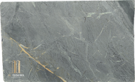 Size 128″ x 77″ x 3cm

Multiple Slabs available.

Product Overview:
Aesthetic Features : Before mineral oil treatment, this is a dove gray soapstone with darker swirls  in almost. After mineral oil treatment is becomes a much darker charcoal gray with a hint of green. This timeless soapstone countertop exudes elegance and sophistication.

Perfectly balancing luxury with a commanding presence, it will be a standout feature in any space.

Applications: Ideal for both indoor and outdoor installations.

Common Uses:

Outdoor Spaces: Perfect for outdoor kitchens, BBQ surrounds, patio bars, poolside counters, garden workstations, beverage stations, fire pit surrounds, buffet stations, backyard prep areas, outdoor sinks, wet bars, rooftop terrace countertops, and pizza oven surrounds.
Indoor Spaces: Excellent for kitchen countertops, bathroom vanities, kitchen islands, laundry room counters, wet bars, tabletops, backsplashes, waterfall edges, and shower surrounds.
Design Style: Classic Soapstone with a hint of green

Product Information:
Stain Resistance

Exceptional Resistance: Non-porous surface eliminates the need for sealing.
Scratch Resistance

Moderate Protection: Soft material; minor scratches can be easily repaired.
Heat Resistance

Superior Performance: Handles high temperatures, making it perfect for kitchen use.
Hardness

Softer Soapstone 
Periodic Maintenance

No Sealing Needed: Non-porous, though periodic oiling is suggested to maintain darker  appearance.
Country of Origin

Brazil
Item Weight

Density: 22 lbs per square foot.