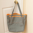 Topside Tote: foliage green with neon orange binding, and foliage green handles Topside Tote: foliage green with neon orange binding, and foliage green handles