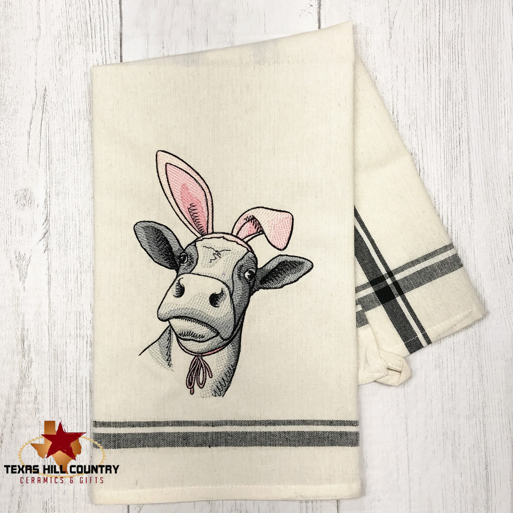 https://cdn10.bigcommerce.com/s-8nf14co6/products/1378/images/7871/cow-with-bunny-ears-easter-farmhouse-kitchen-towel-3-5x5__23248.1647966713.1000.1000.jpg?c=2