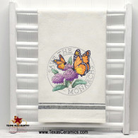 Save the Monarchs Stamp Embroidery design on natural cotton towel with black trim.