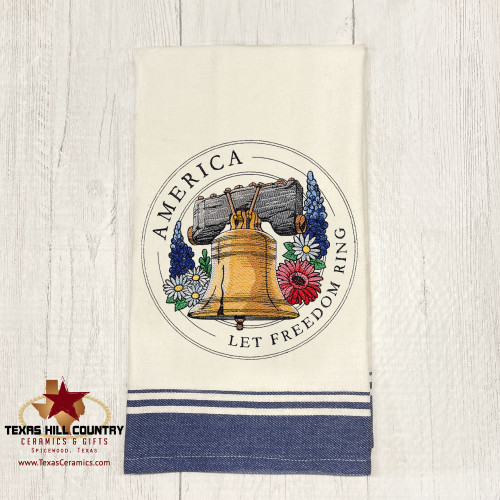 America Let Freedom Ring Liberty Bell embroidered design on blue trim natural cotton towel.