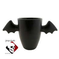 Bat wing handle mug in matte black for hot or cold beverages.  Made by Texas Ceramics.