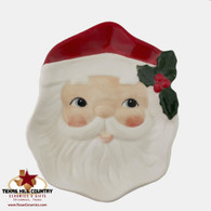 Santa spoon rest or cookie dish with traditional red cap, green holly, white beard. Made in the USA by Texas Ceramics.