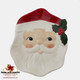 Santa spoon rest or cookie dish with traditional red cap, green holly, white beard. Made in the USA by Texas Ceramics.