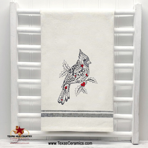 Christmas Cardinal Doodle Embroidery design stitched in black and red on a natural cotton towel with black trim.