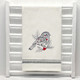 Christmas Chickadee Doodle Embroidery design on natural cotton towel with black trim.