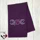 Triple Moon Symbol Embroidery on a Violet cotton waffle weave towel.