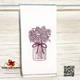 Cotton kitchen dish or tea towel with embroidered Texas Wildflowers in a mason jar.