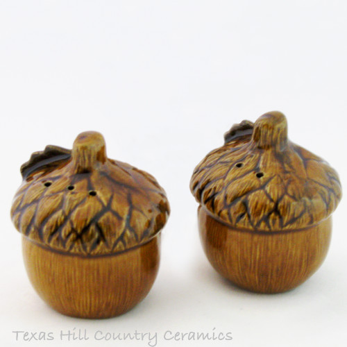 Acorn salt and pepper shakers in rich brown are made in the USA.