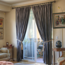 100% silk drapes (shown in Neutral Grey) exclusively for LAUREL AT SUNSET.  Priced per panel. Dry clean only.