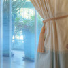 100% silk drapes (shown in natural and seafoam) exclusively for LAUREL AT SUNSET. Priced per panel. Dry clean only.