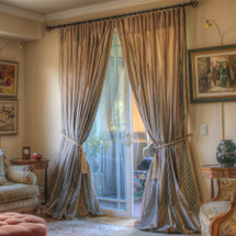 100% silk taffeta drapes excusively for LAUREL AT SUNSET. Priced per panel. Dry clean only.