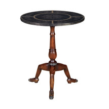 A Studded Manx Table by Theodore Alexander