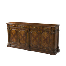 A flame mahogany sideboard by Theodore Alexander