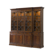 A flame mahogany breakfront library bookcase by Theodore Alexander