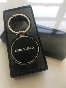 ONE Agency Keyring - New Style!

Shiny Nickel keyring, with double side black aluminum plate.

Laser engraved front side only. 4cm diameter.

Supplied in individual black presentation box.