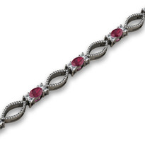 4.76ct t.w Oval Ruby and Diamond Fashion Bracelet in 14k White Gold