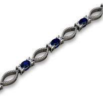 4.76ct t.w Oval Sapphire and Diamond Fashion Bracelet in 14k White Gold