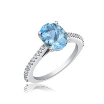 Aqua and Diamonds ring set in 14k gold