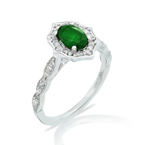 emerald and diamond ring set in 14k white gold