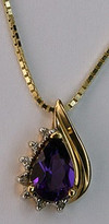 14kt Yellow Gold Pear Amethyst with .10ct Diamonds